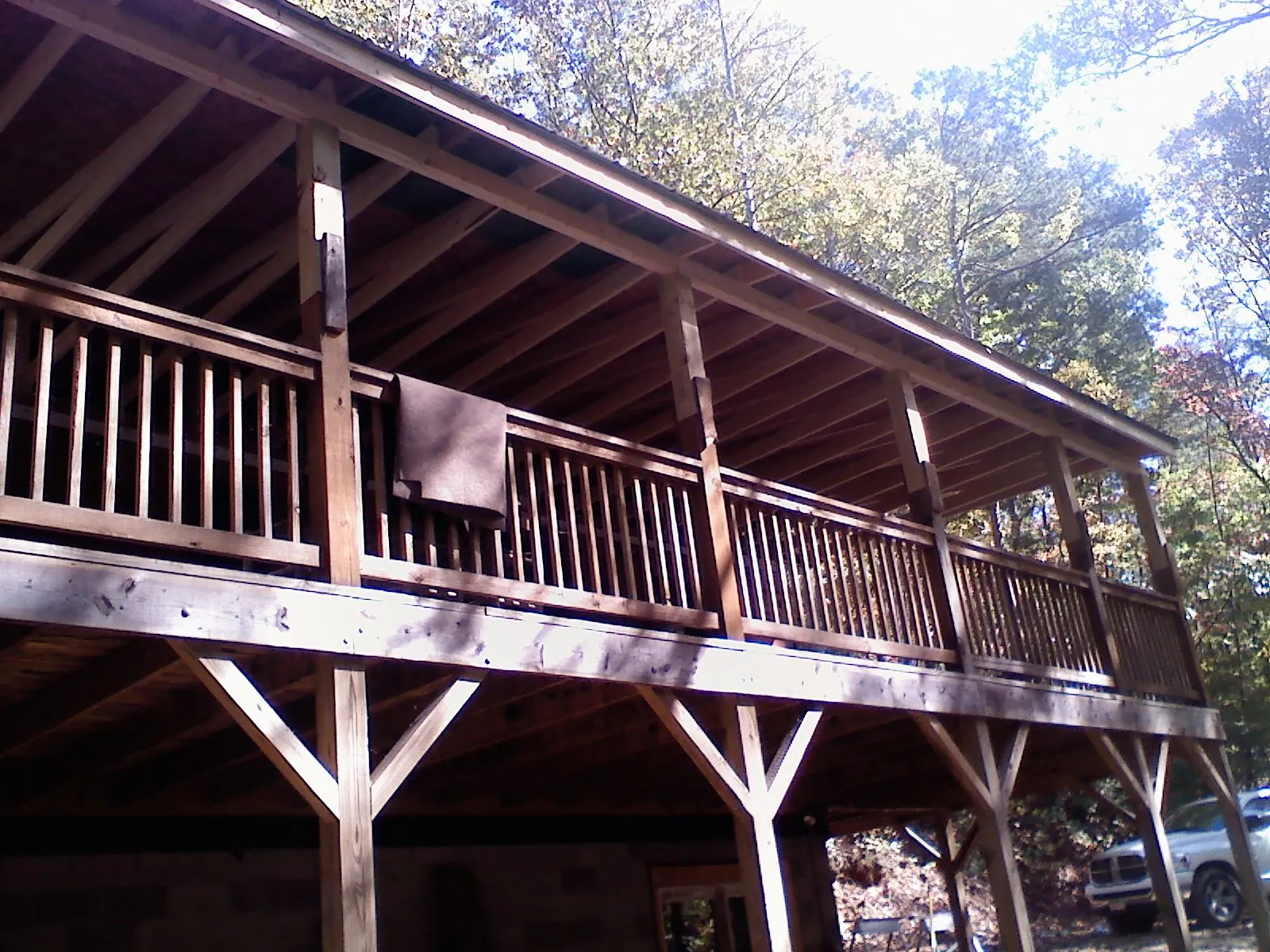 Timber framing under a new elevated porch and deck — Roof Leak Repair in Huron by Roofing Brothers